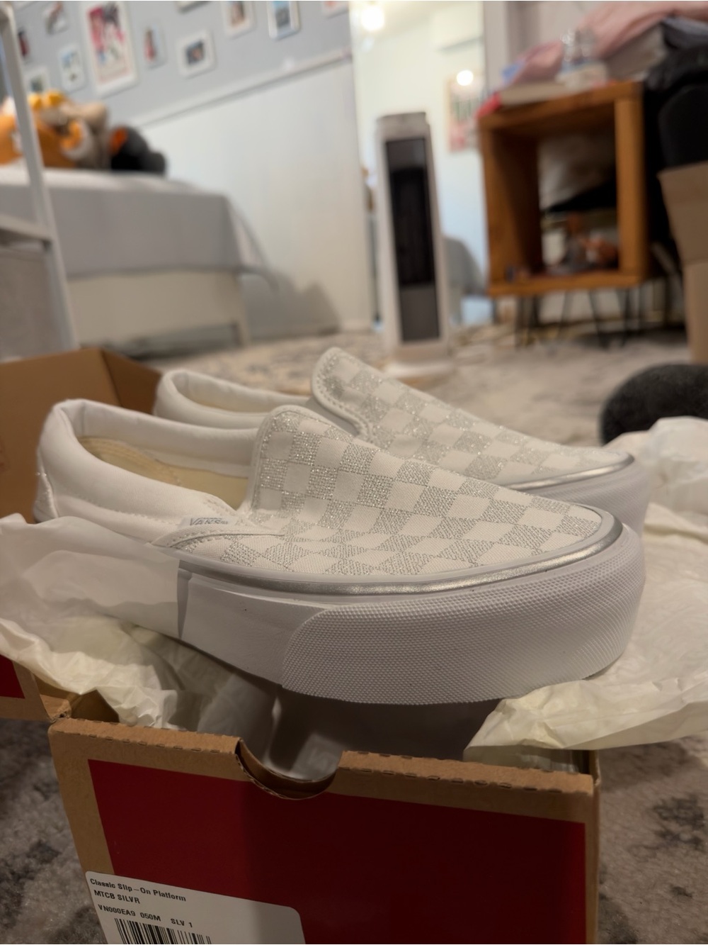 Vans Women’s White Checkerboard Platform Slip-On Sneakers